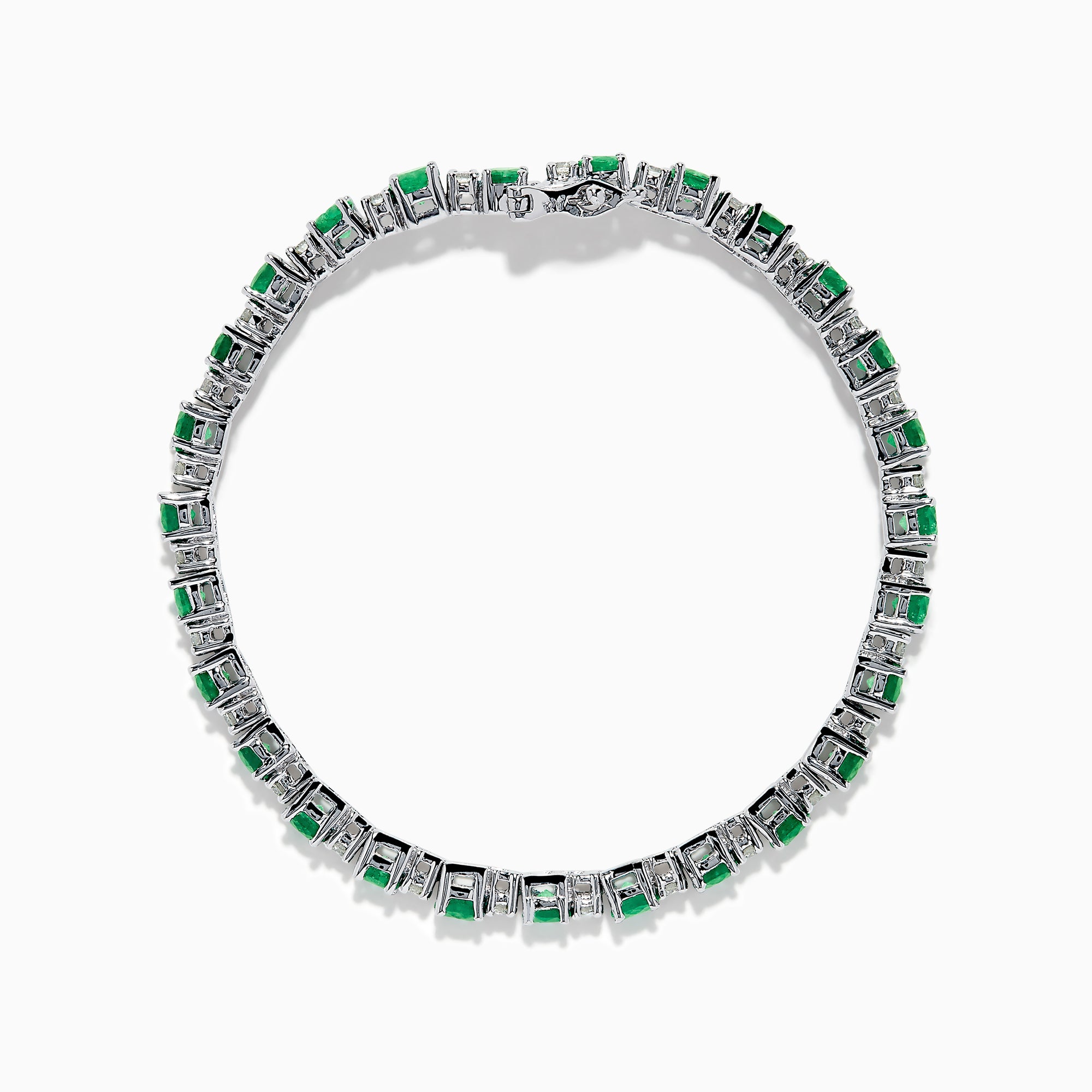 The Brasilica 14K White Gold Emerald and Diamond Tennis Bracelet features alternating round green emeralds and clear diamonds, beautifully displayed on a white background.