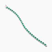 The Brasilica 14K White Gold Emerald and Diamond Tennis Bracelet features alternating round green emeralds and clear diamonds, beautifully displayed on a white background.