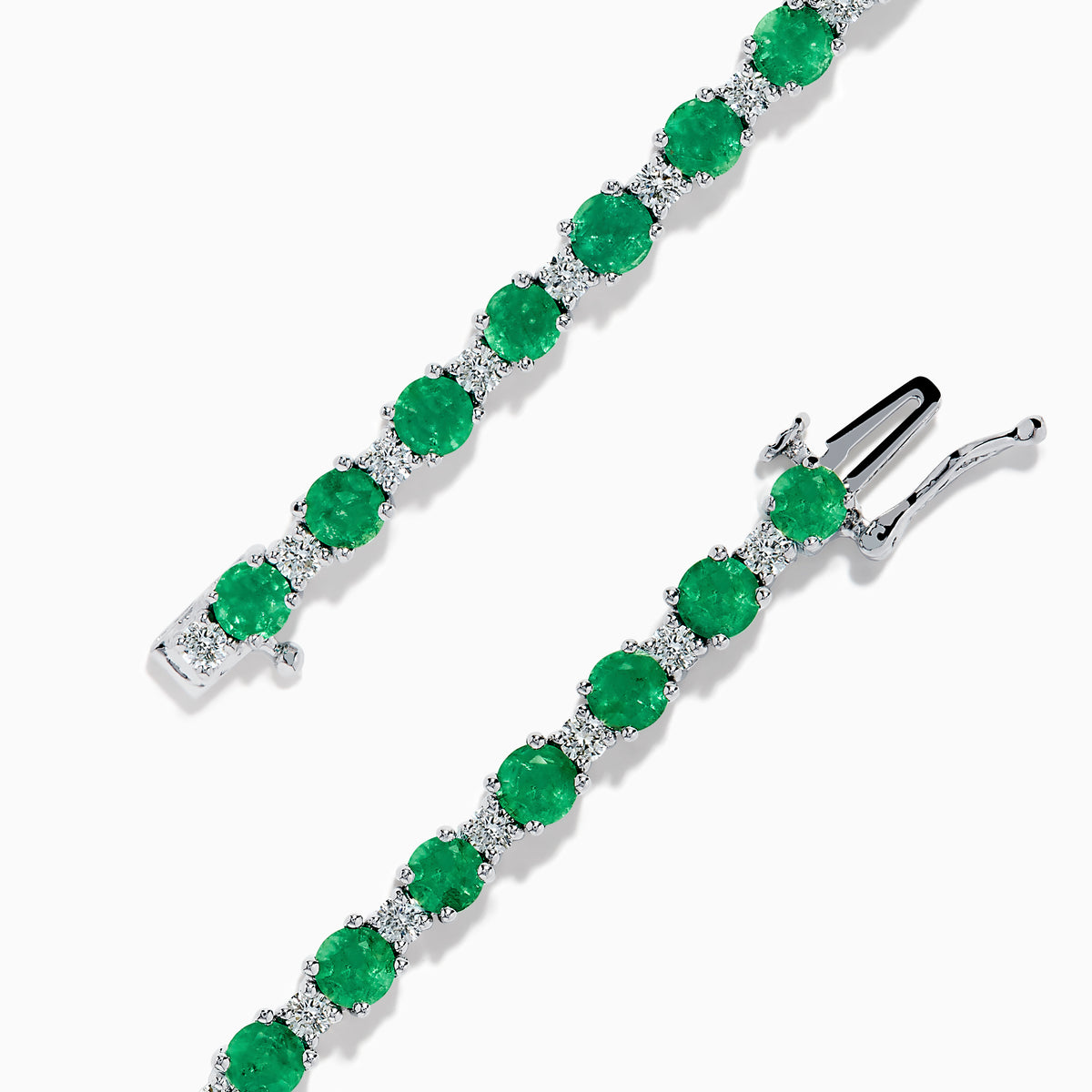 The Brasilica 14K White Gold Emerald and Diamond Tennis Bracelet features alternating round green emeralds and clear diamonds, beautifully displayed on a white background.