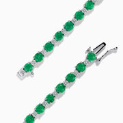 The Brasilica 14K White Gold Emerald and Diamond Tennis Bracelet features alternating round green emeralds and clear diamonds, beautifully displayed on a white background.