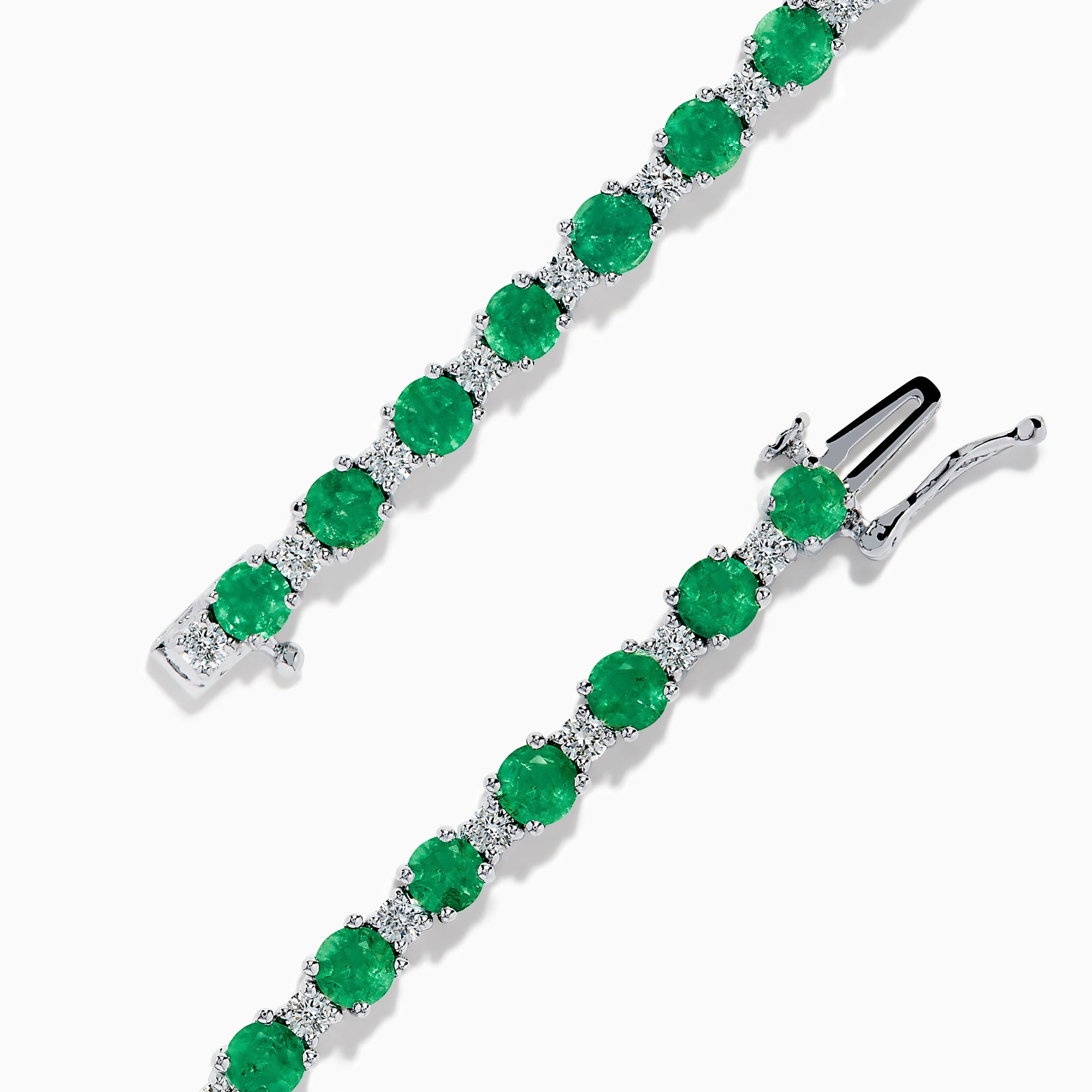 The Brasilica 14K White Gold Emerald and Diamond Tennis Bracelet features alternating round green emeralds and clear diamonds, beautifully displayed on a white background.