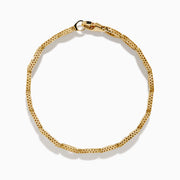 The D'Oro 14K Yellow Gold Chain Link Diamond Bracelet features interlocking oval links and embedded diamonds for a luxurious, elegant look.