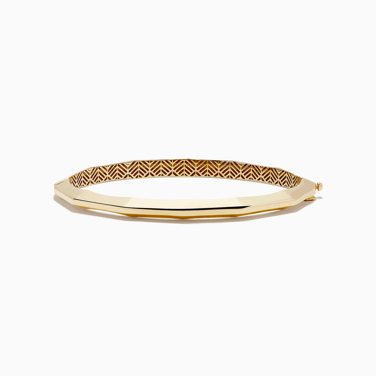 The 14K Yellow Gold Geometric Bamboo Bangle features an octagonal shape, a reflective surface, patterned textured sides in brown and gold hues, and slender raised edges inspired by geometric bamboo design.