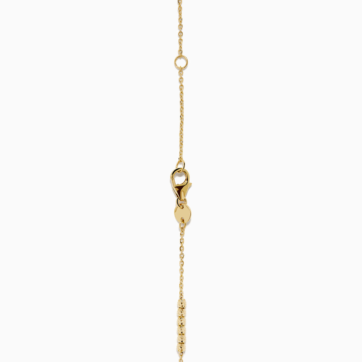 The 14K Yellow Gold Beaded Station Anklet features a delicate fine chain with evenly spaced bead clusters and a secure lobster clasp.