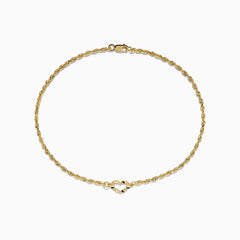 A 14K yellow gold open heart solid glitter chain ankle bracelet, 10 in length, displayed against a plain white background.