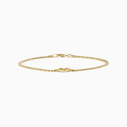 The 14K Yellow Gold Heart Curb Chain Bracelet features a delicate heart-shaped charm on a classic curb chain, shown on a plain white background.