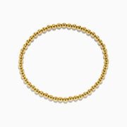 The 14K Yellow Gold Bead Bracelet features smooth, shiny, uniformly sized beads arranged in a circle on a white background.