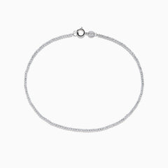 The 14K White Gold Bead Bracelet features small, evenly spaced round beads on a fine chain and includes a lobster clasp closure, displayed in a circular shape.