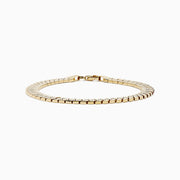 The 14K Yellow Gold Bypass Stampato Bracelet features a gold-toned, flat design with a box clasp, shown against a white background.