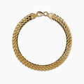 The 14K Yellow Gold Bypass Stampato Bracelet features a gold-toned, flat design with a box clasp, shown against a white background.