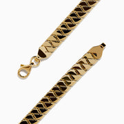 The 14K Yellow Gold Bypass Stampato Bracelet features a gold-toned, flat design with a box clasp, shown against a white background.