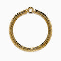 A thick, 14 karat yellow gold hollow snake skin bracelet with a round clasp, displayed in a circular shape on a white background.