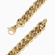 The 14K Yellow Gold Hollow Curb Chain Bracelet 7.5 features thick, interlocking links and a lobster clasp, arranged in a circle on a white background.