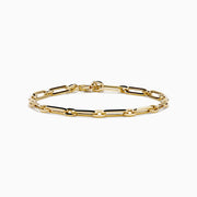 The 14K Yellow Gold Square Chain Link Bracelet features a delicate 14K yellow gold design with square links and a small round tag, shown on a white background.