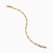 The 14K Yellow Gold Square Chain Link Bracelet features a delicate 14K yellow gold design with square links and a small round tag, shown on a white background.