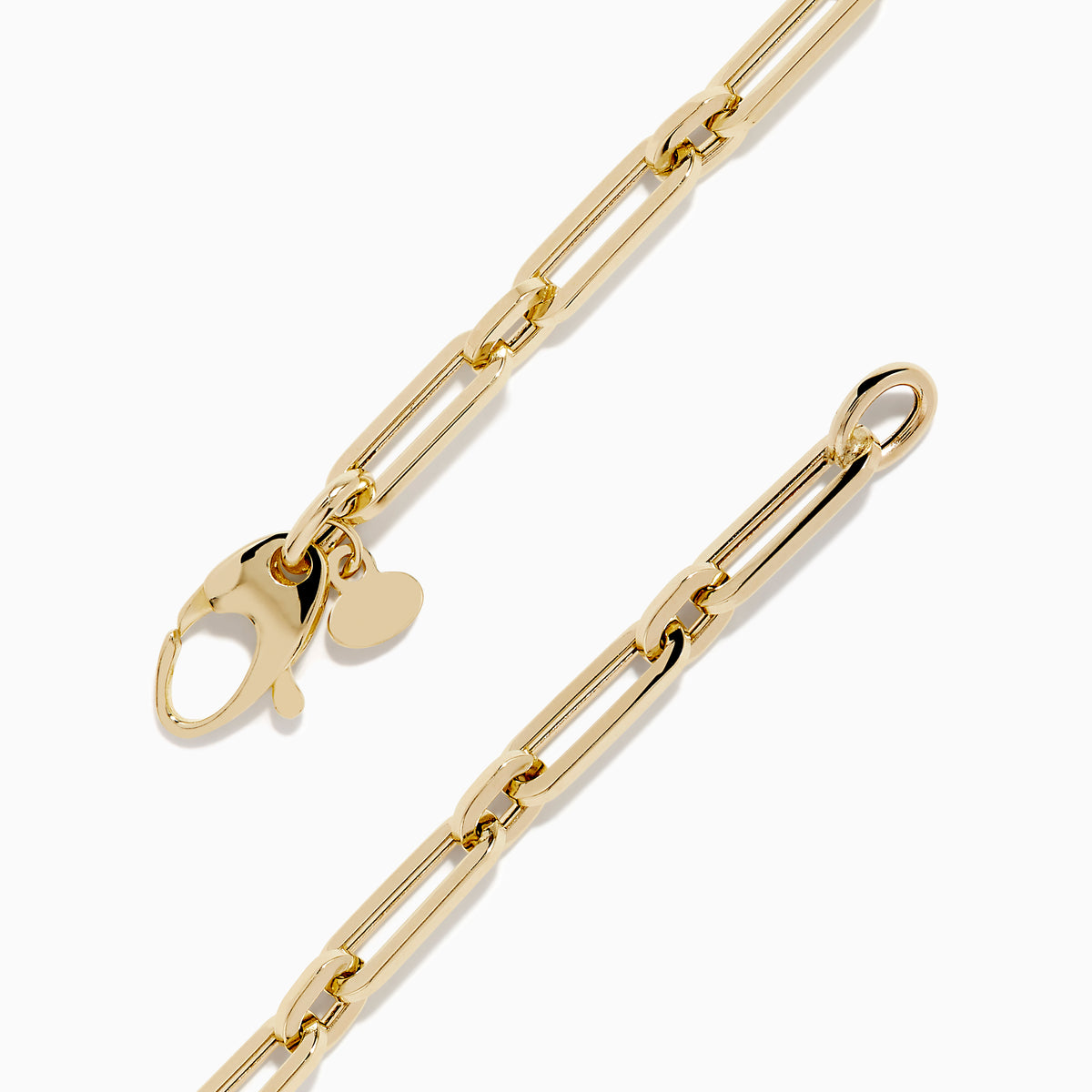 The 14K Yellow Gold Square Chain Link Bracelet features a delicate 14K yellow gold design with square links and a small round tag, shown on a white background.