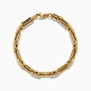 The 14K Yellow Gold Hollow Oval Chain Link Bracelet features polished, interconnected oval links and is displayed against a plain white background.