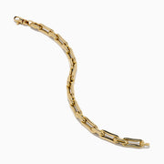 The 14K Yellow Gold Hollow Oval Chain Link Bracelet features polished, interconnected oval links and is displayed against a plain white background.