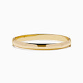 The 14K Yellow Gold Oval with Hinge Bracelet features a polished, smooth surface and classic oval hinge design, displayed against a plain white background.