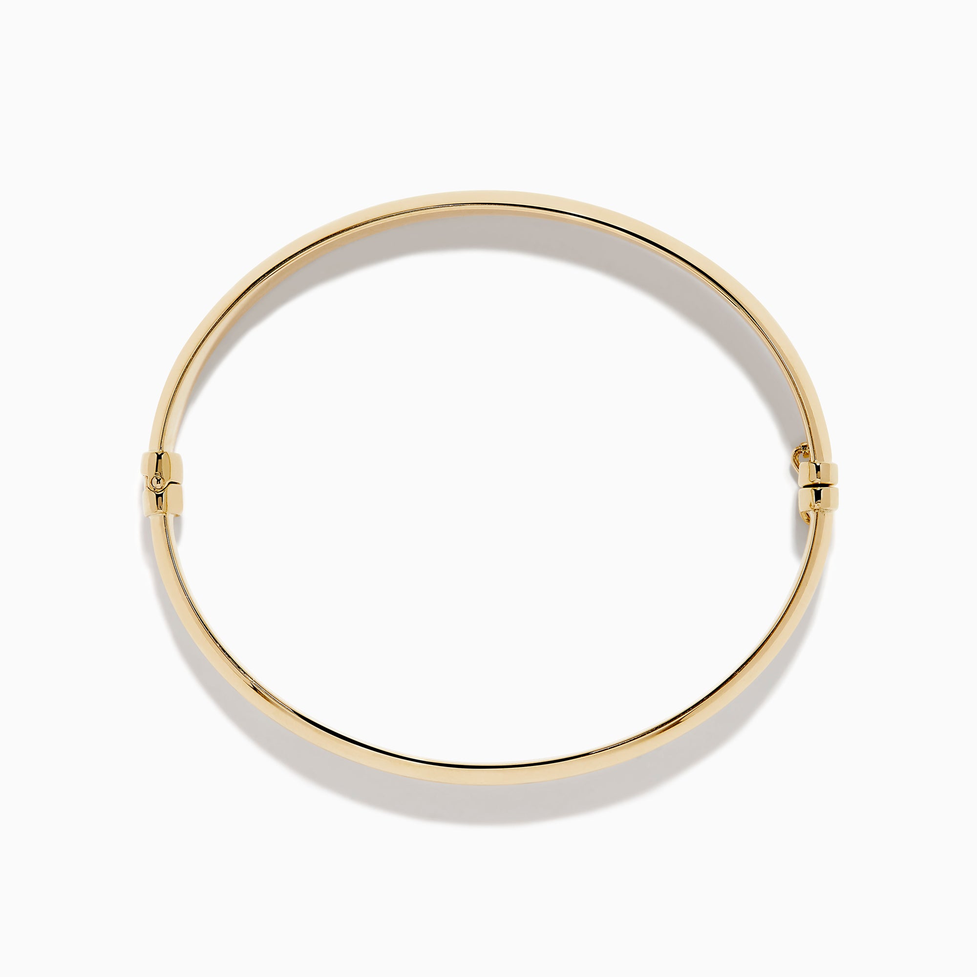 The 14K Yellow Gold Oval with Hinge Bracelet features a polished, smooth surface and classic oval hinge design, displayed against a plain white background.
