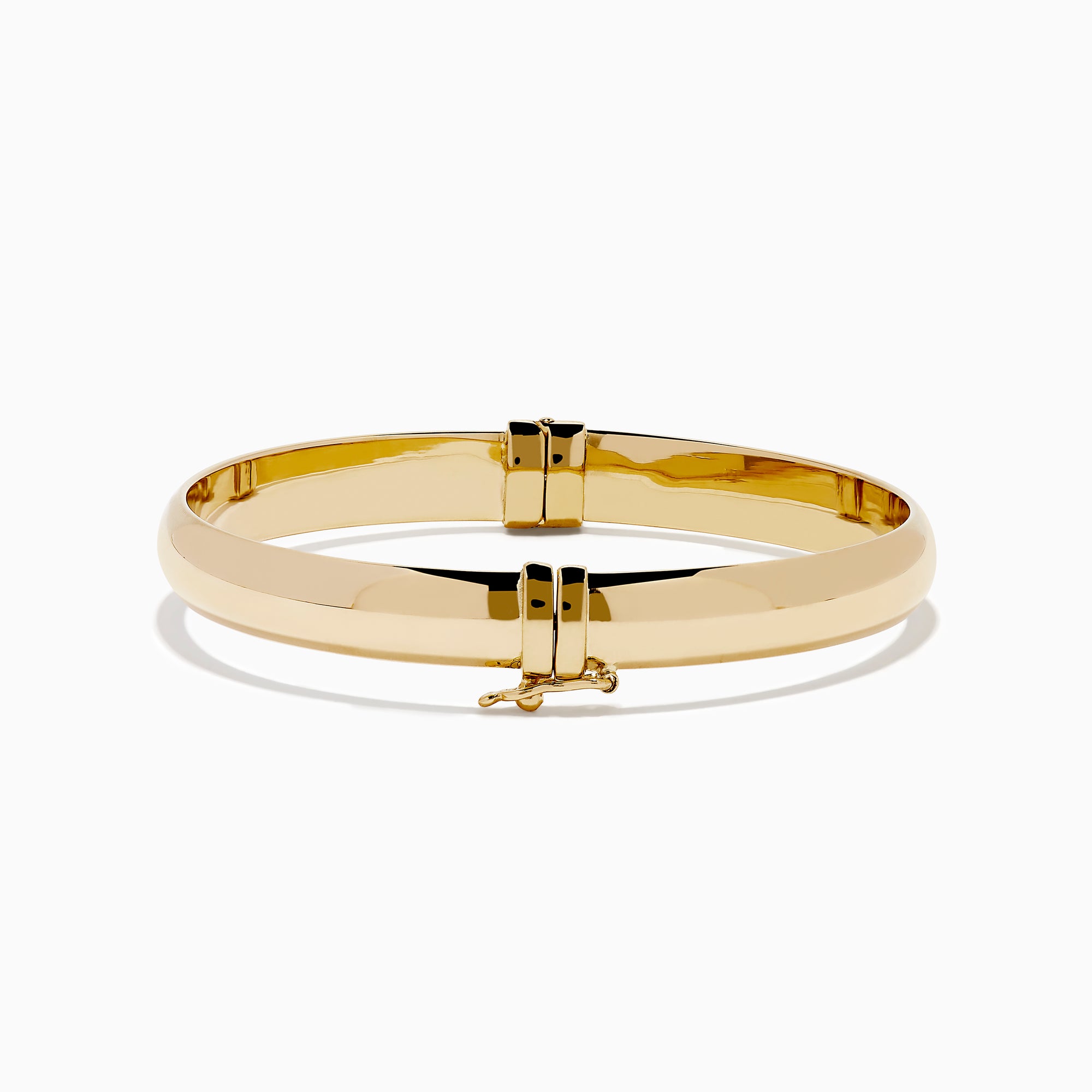 The 14K Yellow Gold Oval with Hinge Bracelet features a polished, smooth surface and classic oval hinge design, displayed against a plain white background.