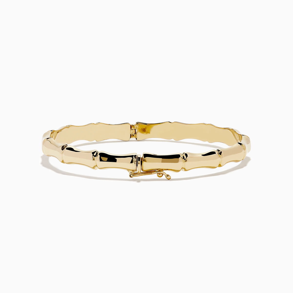 The 14K Yellow Gold Bamboo Hinge Bangle features a polished, bamboo-inspired texture and is photographed on a white background.