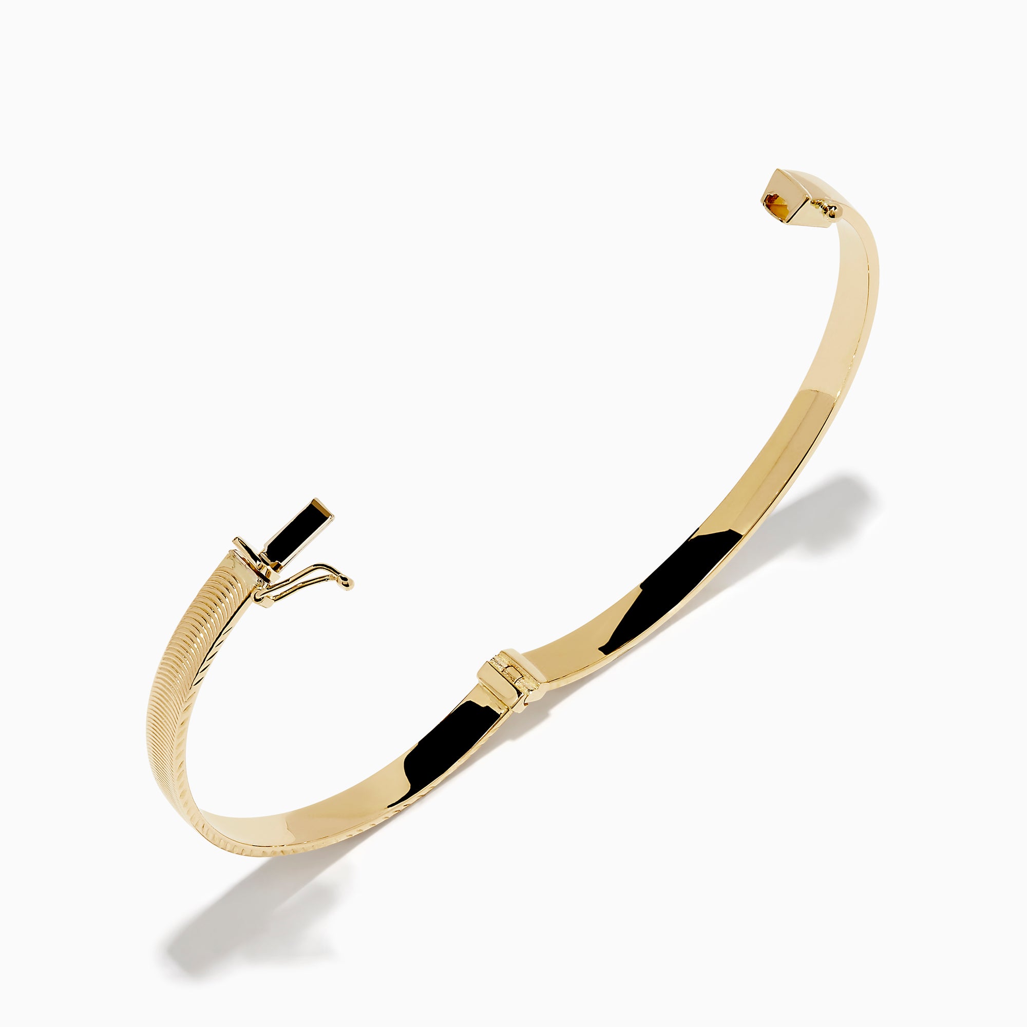The 14K Yellow Gold Hollow Hinge Bracelet features a polished finish with subtle textured detailing along the edge, shown on a white background.