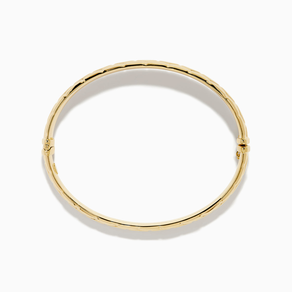 The 14K Yellow Gold Textured Hinge Bracelet features a shiny finish and a geometric diamond-patterned texture around its outer surface, shown on a white background.