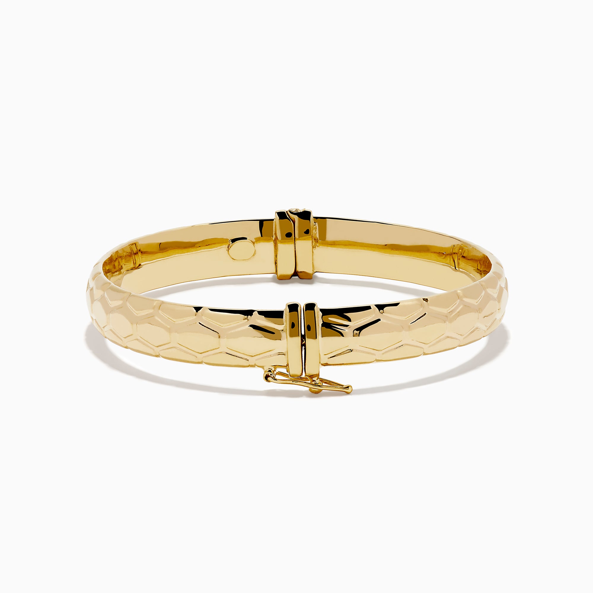 The 14K Yellow Gold Textured Hinge Bracelet features a shiny finish and a geometric diamond-patterned texture around its outer surface, shown on a white background.