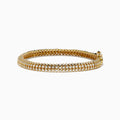 The DOro 14K Yellow Gold Bracelet features three rows of bezel-set diamonds and a secure box clasp, offering a polished and elegant finish.