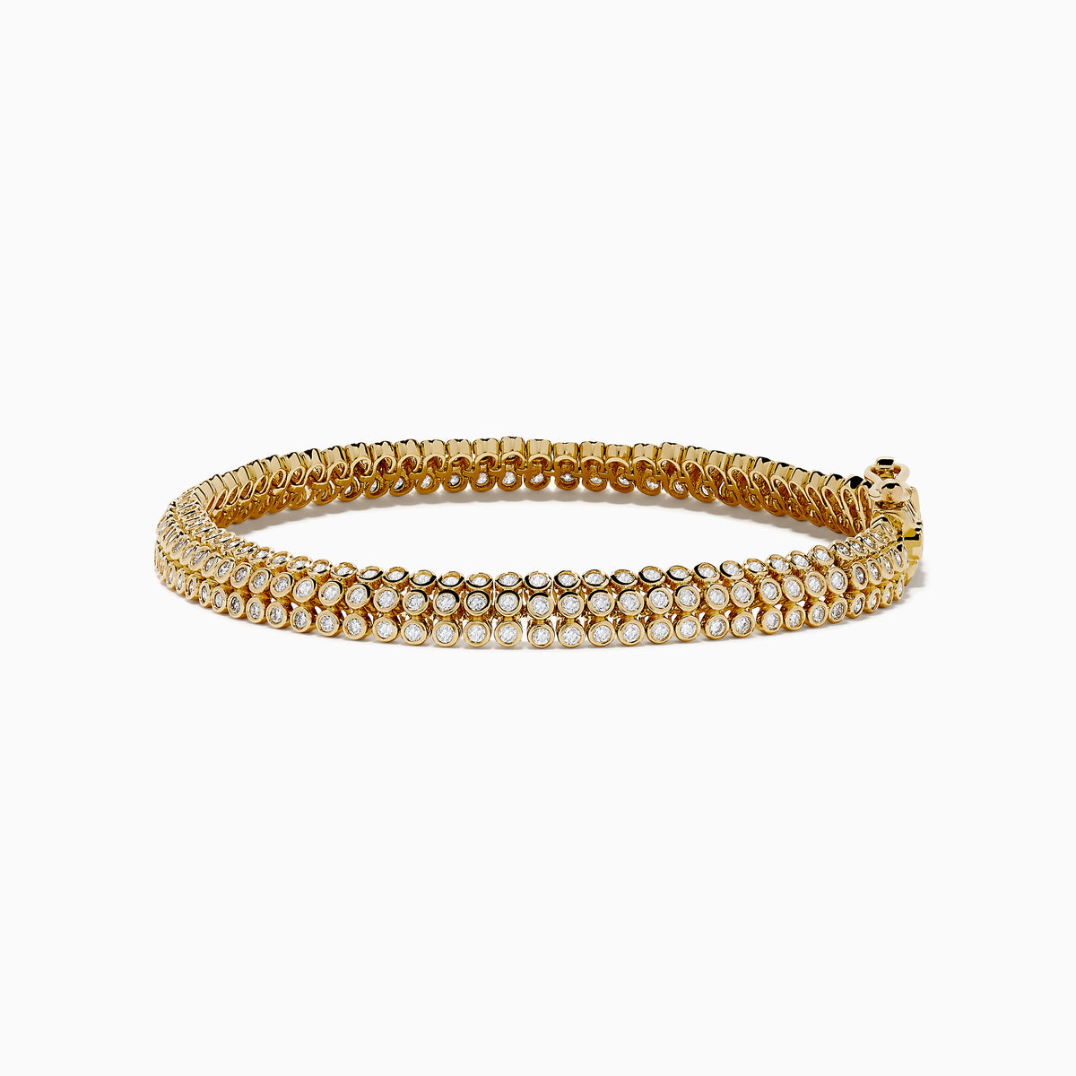 The DOro 14K Yellow Gold Bracelet features three rows of bezel-set diamonds and a secure box clasp, offering a polished and elegant finish.
