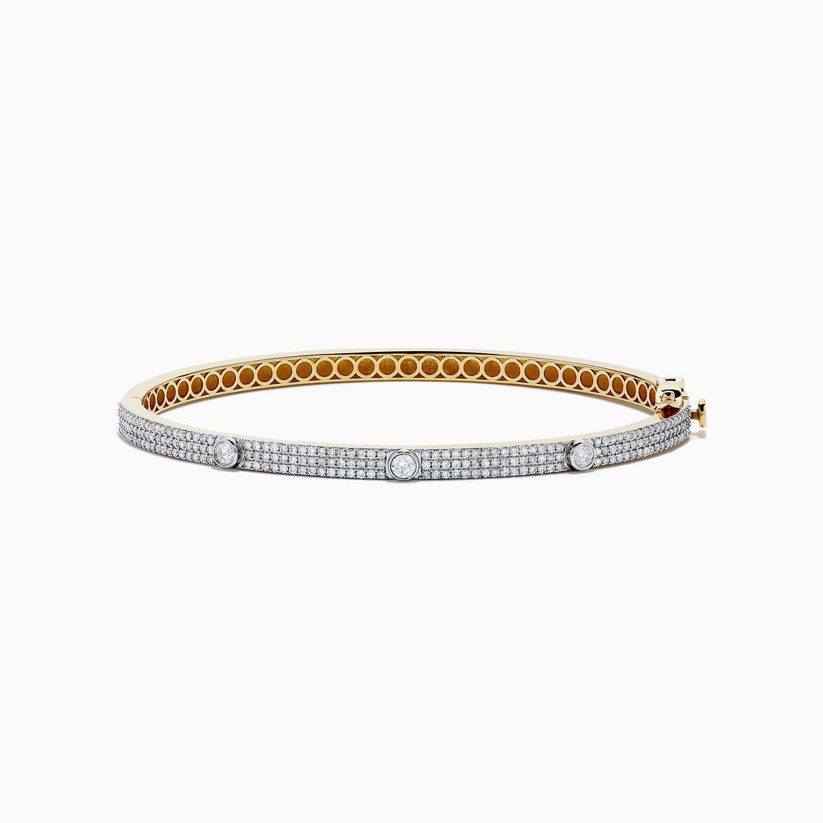 The DOro 14K Yellow Gold Diamond Bangle showcases a honeycomb interior and three large round diamonds set among smaller diamonds on its exterior.