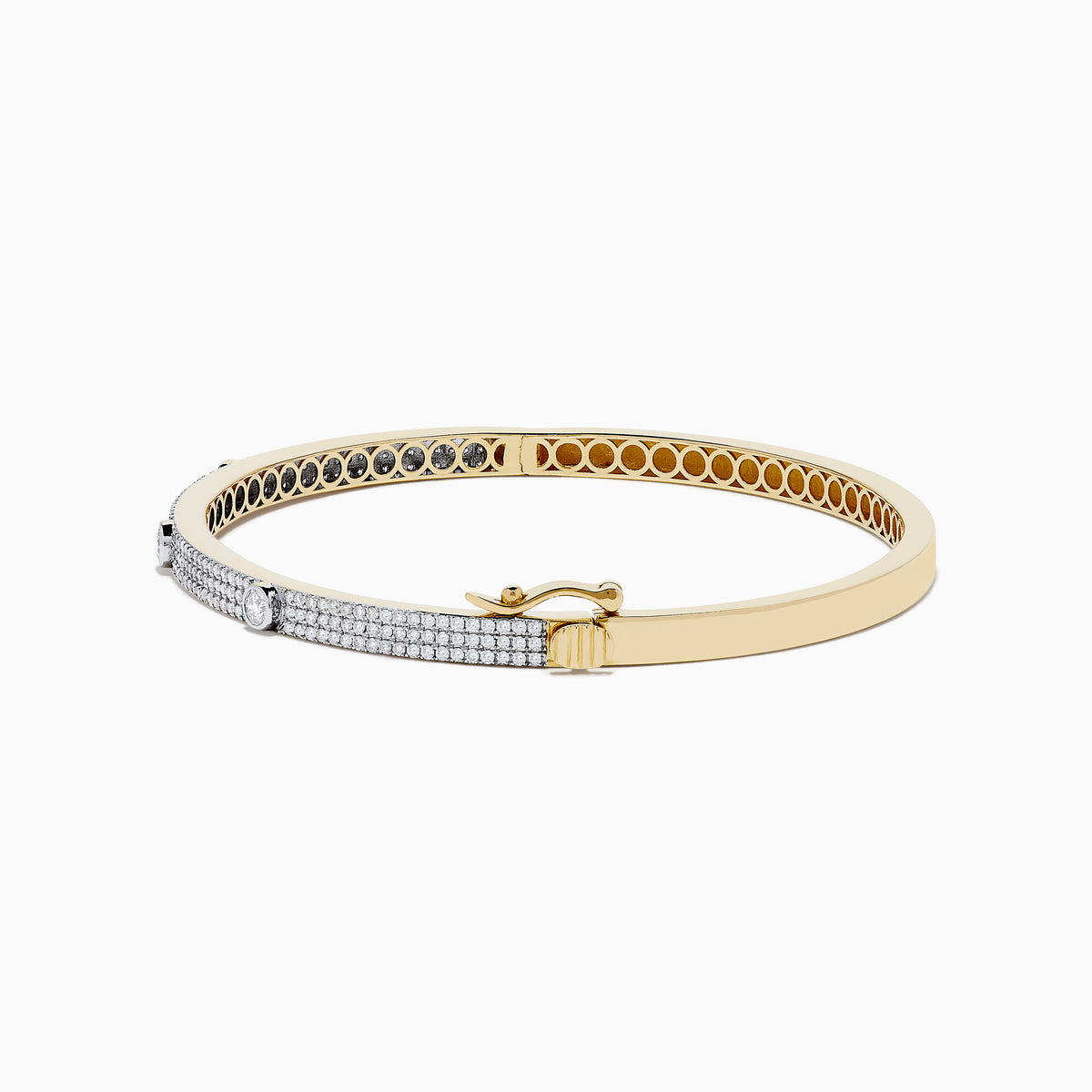 The DOro 14K Yellow Gold Diamond Bangle showcases a honeycomb interior and three large round diamonds set among smaller diamonds on its exterior.