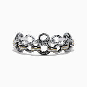 The 925 Sterling Silver Two Tone 18K Yellow Gold Textured Link Diamond Bracelet features twisted, textured links with small gold accents and alternating patterns, displayed against a white background.