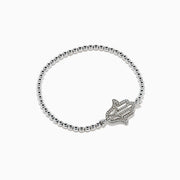 The 925 Sterling Silver Diamond Beaded Stretchy Hamsa Bracelet features a sparkling Hamsa hand charm and is elegantly displayed on a plain white background.