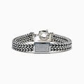The Men's 925 Sterling Silver Chain-Link Diamond Bracelet features a woven silver design, a rectangular diamond-studded centerpiece, and a round clasp, displayed on a white background.