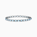 The Aquarius 14K White Gold Aquamarine Tennis Bracelet 8.23 TCW showcases a continuous row of round, light blue aquamarines in individual prong settings for timeless elegance.