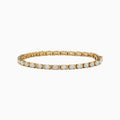 The 14K Yellow Gold Opal and Diamond Tennis Bracelet features a row of round white opals set in gold prongs, accented with diamonds, displayed on a white background.