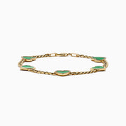 The 14K Yellow Gold Malachite and Diamond 5 Motif Heart Bracelet features five green malachite heart charms, each bordered by diamond-accented stones, evenly spaced along a yellow gold chain with a secure clasp.