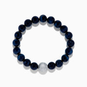 The Mens Tigers Eye and Meteorite Beaded 8 String Bracelet features glossy dark beads with a single textured meteorite bead, arranged in a circle on a white background.