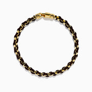 The Mens 925 Gold Plated Silver Leather Woven Bracelet features interwoven dark brown leather and a secure clasp, displayed on a plain white background.
