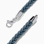 Men's 925 Sterling Silver and Leather Braided Bracelet with a silver clasp and rectangular 925 sterling silver accent engraved with a chevron pattern.