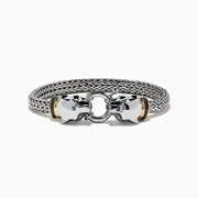 The 925 Sterling Silver and 18K Yellow Gold Panther Braided Chain Bracelet features two polished panther head clasps joined by a circular link, with gold accents behind each head.
