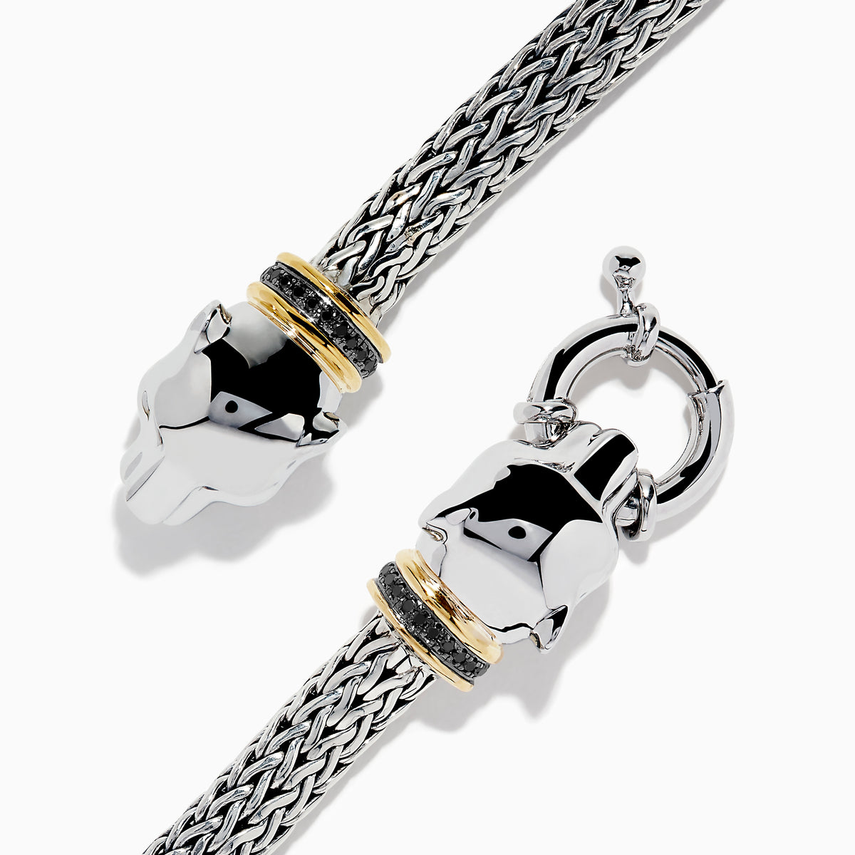 The 925 Sterling Silver and 18K Yellow Gold Panther Braided Chain Bracelet features two polished panther head clasps joined by a circular link, with gold accents behind each head.
