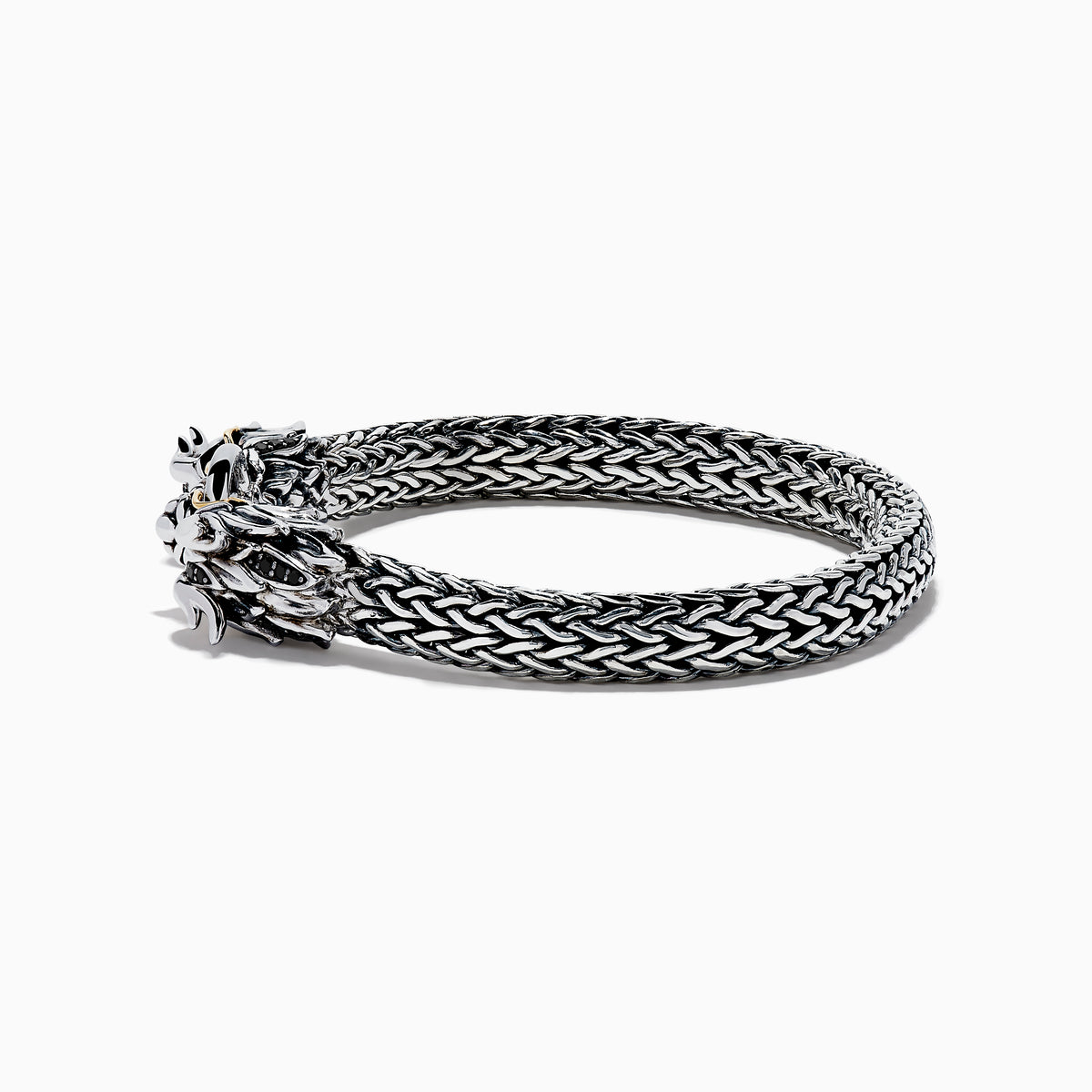 The Mens 925 Silver & 14K Yellow Gold Black Sapphire and Tsavorite Dragon Bracelet features two detailed dragon heads with black sapphire eyes, facing each other and joined by a round clasp.
