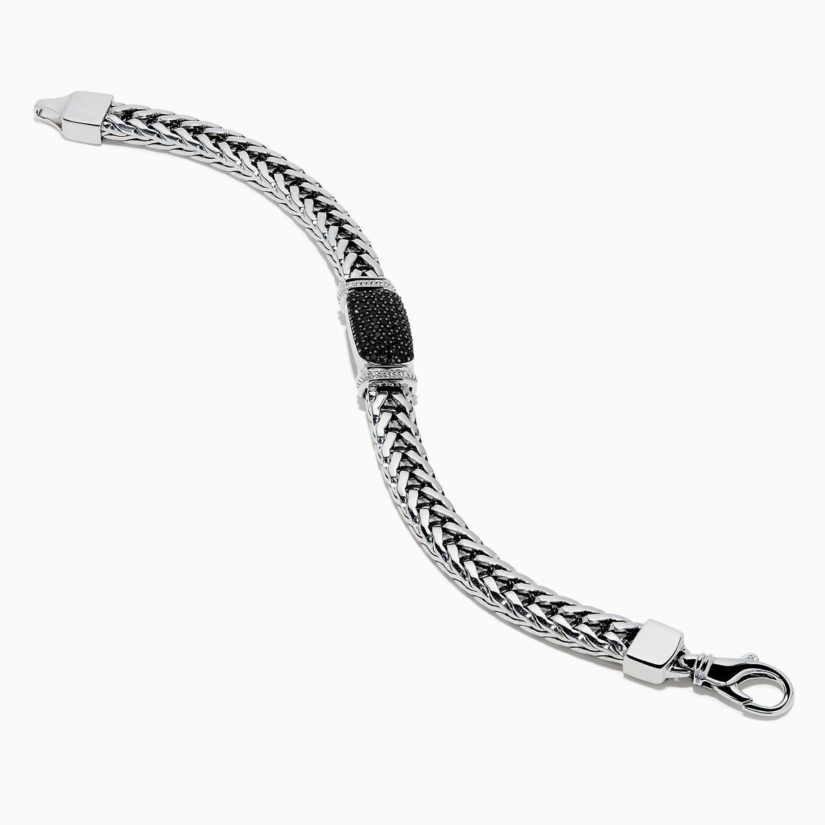 The Mens Sterling Silver Black Spinel Bracelet features a woven chain, a rectangular textured black spinel centerpiece, and a secure clasp closure, shown on a white background.