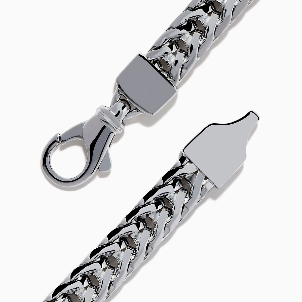 The Mens Sterling Silver Black Spinel Bracelet features a woven chain, a rectangular textured black spinel centerpiece, and a secure clasp closure, shown on a white background.