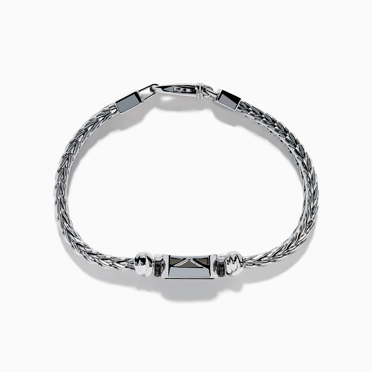 The Mens 925 Sterling Silver Onyx and Black Diamond Bracelet features a woven chain design, a rectangular onyx center stone in a decorative frame, black diamond accents, and a secure lobster clasp closure.