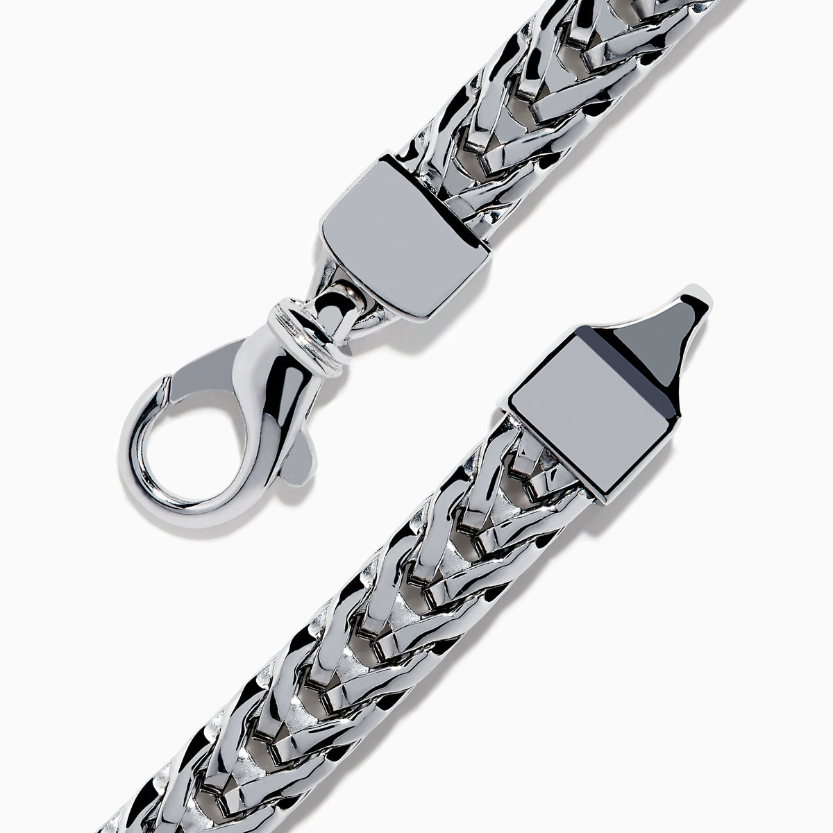 The Mens 925 Sterling Silver Onyx and Black Diamond Bracelet features a woven chain design, a rectangular onyx center stone in a decorative frame, black diamond accents, and a secure lobster clasp closure.