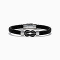 The Men's 925 Sterling Silver Black Spinel Leather Bracelet features black braided leather, sterling silver accents, and a decorative clasp with a black and silver loop design, displayed on a white background.